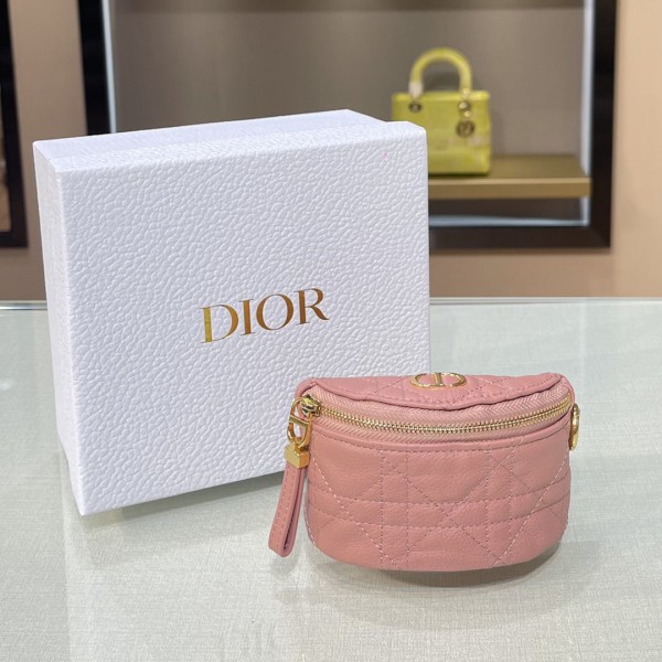 Christian Dior's uniquely shaped small wallet Pink/ Black/ Blue